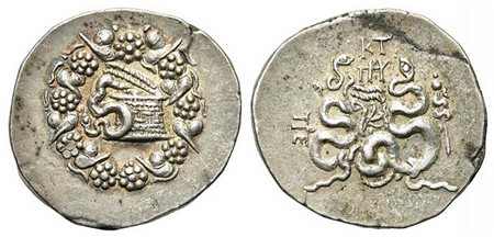 Mysia, Pergamon, Cistophoric Tetradrachm, ca. 166-67 BC; AR (g 12,47; mm 28; h 1), ca. 104-98 BC. Cista mystica within ivy wreath; Rv. Bow case with serpents; above, KT and monogram above, civic monogram to l., serpent-entwined th