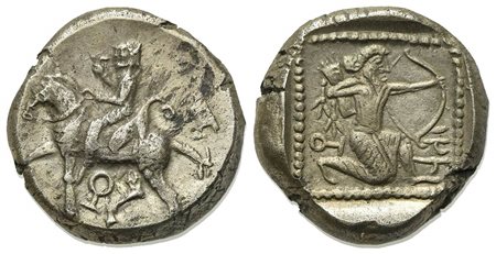 Cilicia, Tarsos, Stater, ca. 420-410 BC. AR (g 10.01, mm 19, h 6). Horseman riding l., holding flower; monogram below; Rv.Archer kneeling r., drawing bow; tree and monogram to l.; all in dotted square within incuse square. SNG BnF