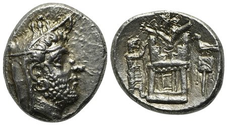 Kings of Persis, Uncertain king, Drachm, mid-late 2nd century BC. AR (g 4,03; mm 16; h 7). Head r., wearing diadem and satrapal cap surmounted by eagle; Rv. Fire temple, Ahura-Mazda above, on l., king standing r., to r., standard 