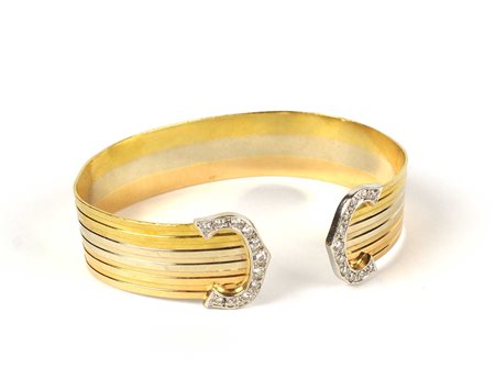 BRACCIALE MANETTA IN ORO TRE COLORI Con diamanti taglio brillante per 0,40...