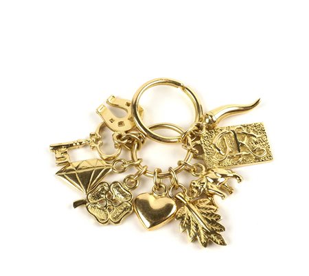 PORTACHIAVE IN ORO GIALLO 18KT FIRMATO CAPUANO Con otto charms soggetti...