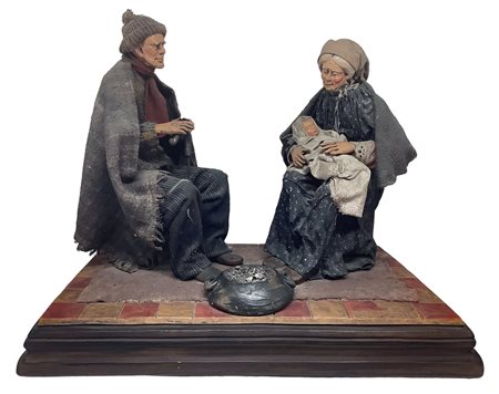 Statuetta raffigurante gruppo di due personaggi anziani e neonato, soggetti...