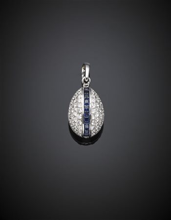 FABERGE'
Uovo pendente in oro bianco, smalto guilloché blu e diamanti per compl