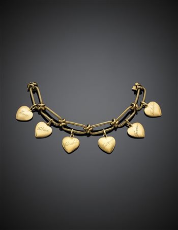 Bracciale in oro giallo a catena con sei cuori pendenti, g 103,30 circa, lungh.