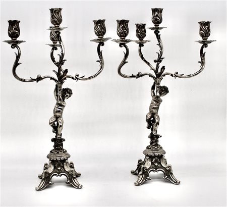 Lotto di candelabri in argento 800