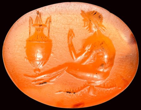 A romana agate intaglio. Satyr and a vase. 