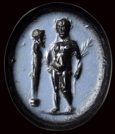 A roman nicolo intaglio. Athlete with herm. 