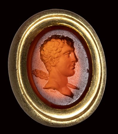 A fine roman carnelian intaglio set in a gold frame. Bust of Hercules. 