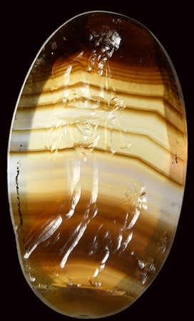 A fine roman banded agate intaglio. Silenus with panther. 