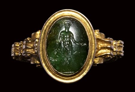 An early Victorian gold ring, set with a roman intaglio in chromian chalcedony. Bonus Eventus. 