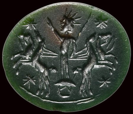 A roman green jasper astrological intaglio. Helios with solar quadriga. 