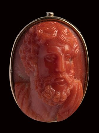 A fine neoclassical  coral cameo set in a metal brooch. Bust of a bearded philosopher. 