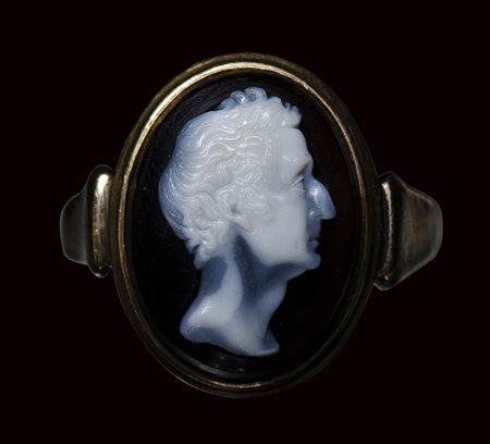 A onyx  cameo set on a modern gold ring. Portrait of Wellington.