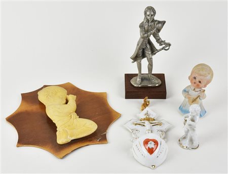 LOTTO DI PICCOLE SCULTURE in ceramica, legno e metallo Italia, seconda meta'...