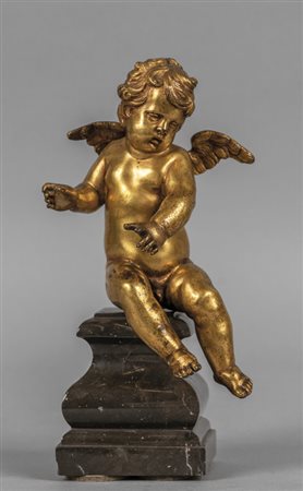 Putto, scultura in bronzo dorato poggiante su 