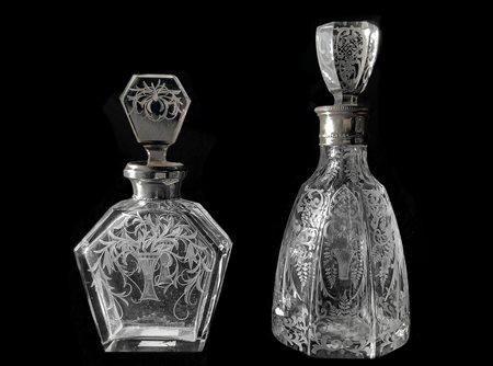 N.2 Bottiglie da liquore bulinate con imboccatura in argento . XX secolo.