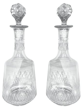 Coppia bottiglie in cristallo. XX secolo. H cm 28, h cm 30