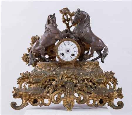 Orologio parigina in bronzo dorato e argentato. Francia, ultimo quarto del...