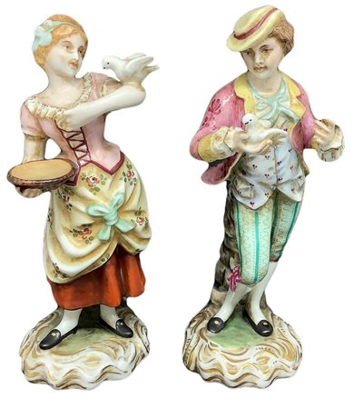 Coppia di statuette in porcellana policroma di Capodimonte raffigurante...