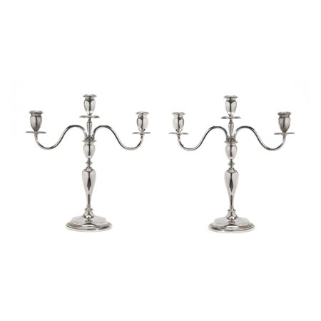 Coppia di candelabri in argento