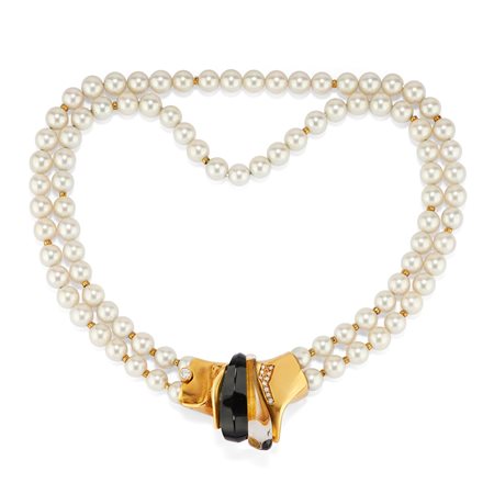 Collana con perle coltivate, cristallo di rocca, onice e diamanti
