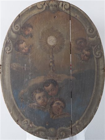 Maestro del XVII secolo "Ostensorio con putti". Olio su tavola ovale. Cm 94x71.