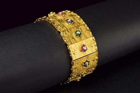 Bracciale in oro, diamanti, zaffiri, rubini e smeraldi 