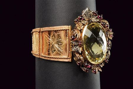 Bracciale in oro, argento e topazio