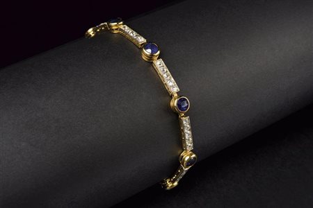 Bracciale in oro due colori diamanti e zaffiri