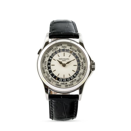 PATEK PHILIPPE - Elegante "Ore del mondo" ref. 5110 d'oro bianco 18k, automatico. Accompagnato dalla scatola in legno