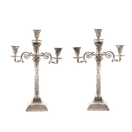 Coppia di candelabri in argento