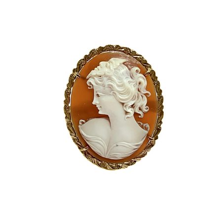 Anello in oro con cameo ovale fondo scuro figura viso donna