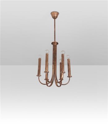 UN LAMPADARIO, anni "30. <br>Ottone ramato. 