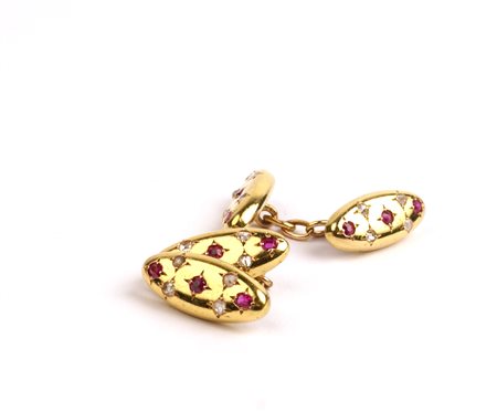 GEMELLI IN ORO GIALLO 18KT anni 40/50 con rubini tondi e rose di diamanti...