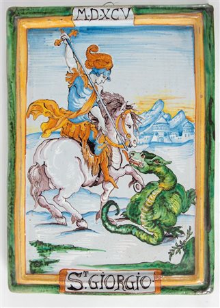 PLACCA in maiolica raffigurante San Giorgio che uccide il drago. Fine XIX...