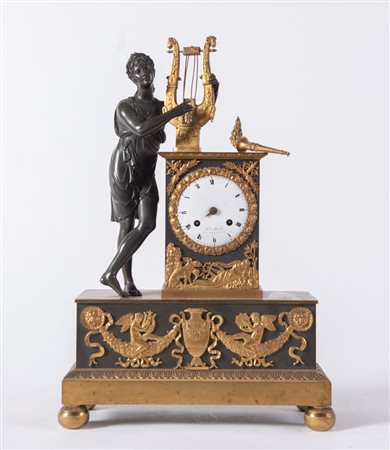 OROLOGIO in bronzo dorato con allegoria della Musica. Prima metà del XIX...