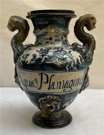 Antico vaso biansato in maiolica istoriata, anse zoomorfe decorate con maschero