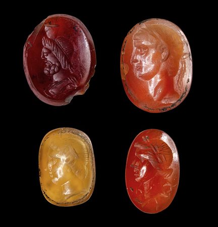 A group of 4 roman agate and carnelian intaglios. Varia