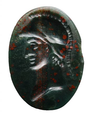 A postclassical bloodstone intaglio. Bust of a warrior.