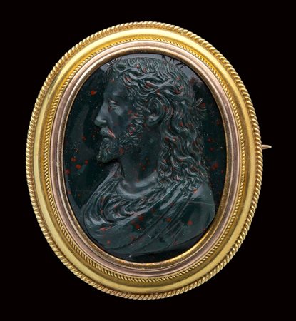 An heliotrope cameo mounted in a modern gold brooch. Bust of Christ. 