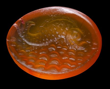 A renaissance carnelian intaglio. Dolphin. 