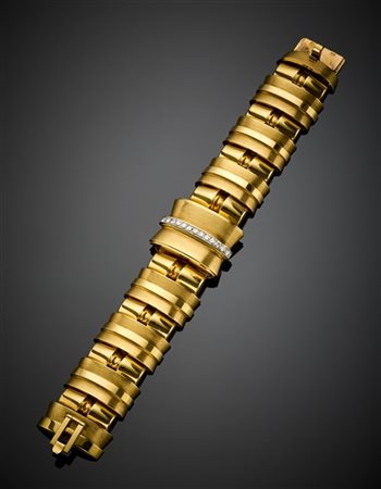 ROLEX
Orologio/bracciale modulare in oro giallo con quadrante a scomparsa rifin