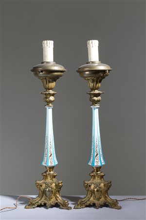 Pair of bronze and porcelain candlesticks-lamps