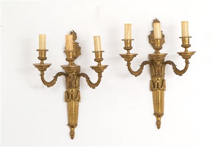 Two sconces in golden-plated bronze. 19th c