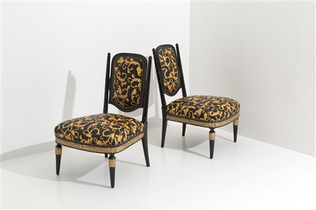 Pair of Italian armchairs in wood and fashion leather