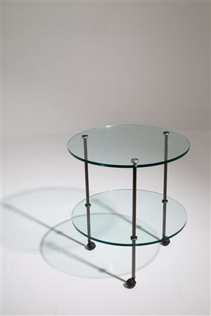 Round coffee table with two glass shelves. '70s