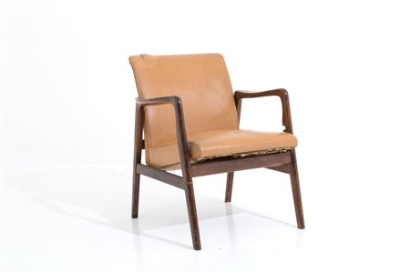 Brown sky armchair with wooden armrests. '50s