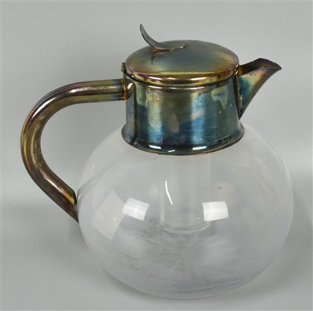 CARAFFA IN CRISTALLO con versatoio in metallo argentato, h. 25cm 1990 circa