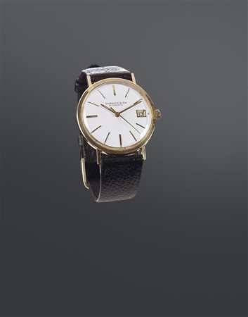 TIFFANY & CO. Solo tempo, anni '60 Diam. 34 Cassa in oro giallo 14 Kt, in due...