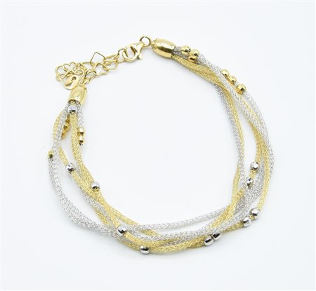 BRACCIALE IN ORO GIALLO E BIANCO in oro bicolore 18kt, maglia a rete...